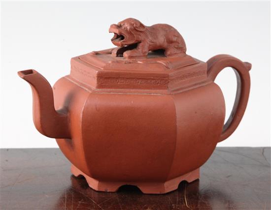 A Chinese Yixing hexagonal teapot and cover, 18th century, height 12.5cm, loss to sprig on cover